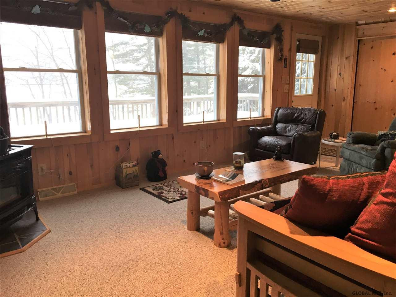 2031 North Shore Road Hadley, NY 12835 - Photo 13 of 44 Beautiful lake view from living room