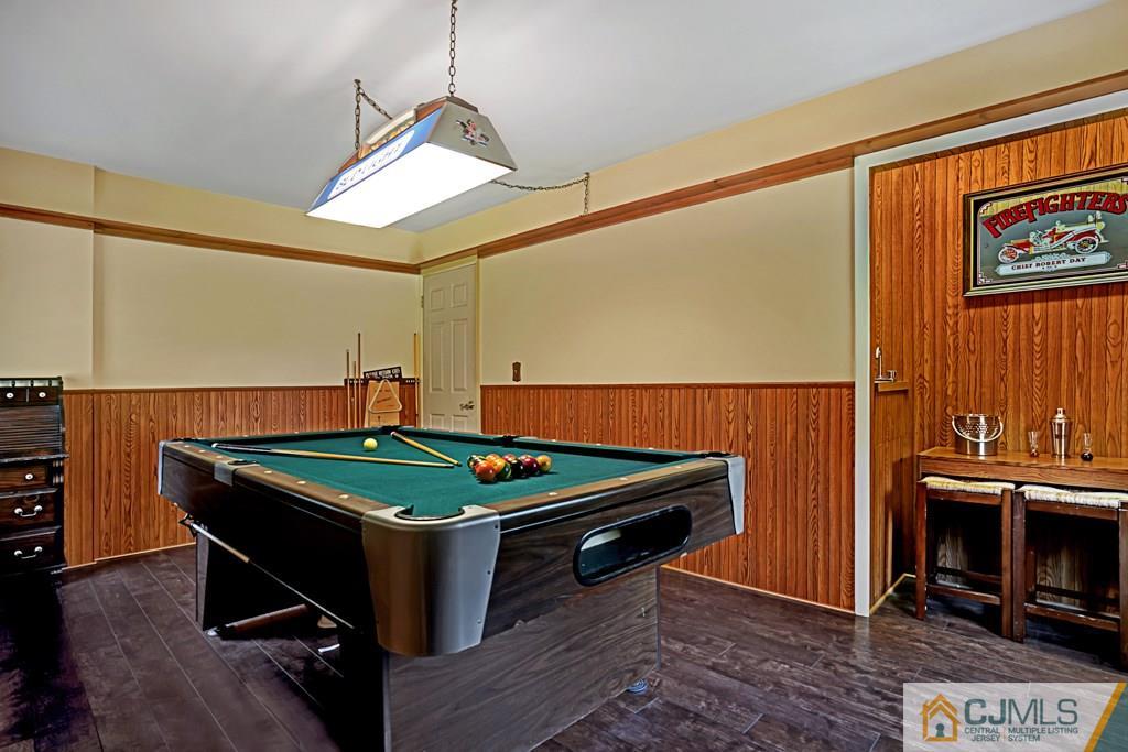 10 Overbrook Road Somerset, NJ 08873 - Photo 12 of 26 a room with furniture pool table and a mirror