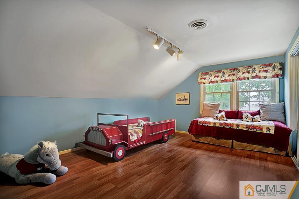 10 Overbrook Road Somerset, NJ 08873 - Photo 19 of 26 a living room with furniture and a large window