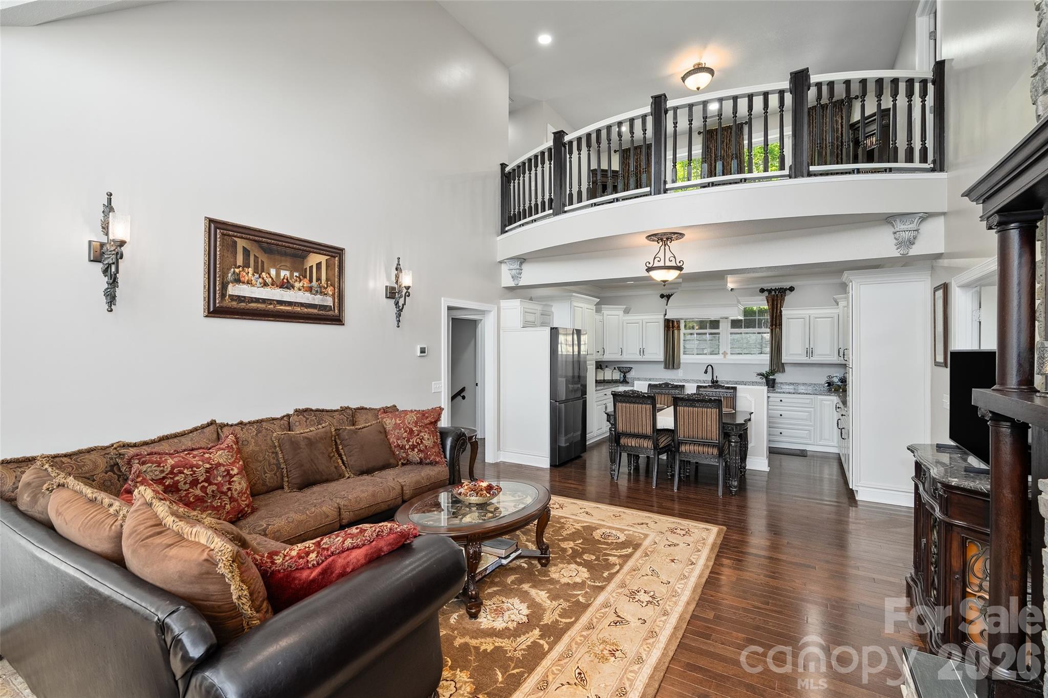 114 Nesting Ridge Waynesville, NC 28785 - Photo 12 of 40 a living room with furniture kitchen view and a dining table
