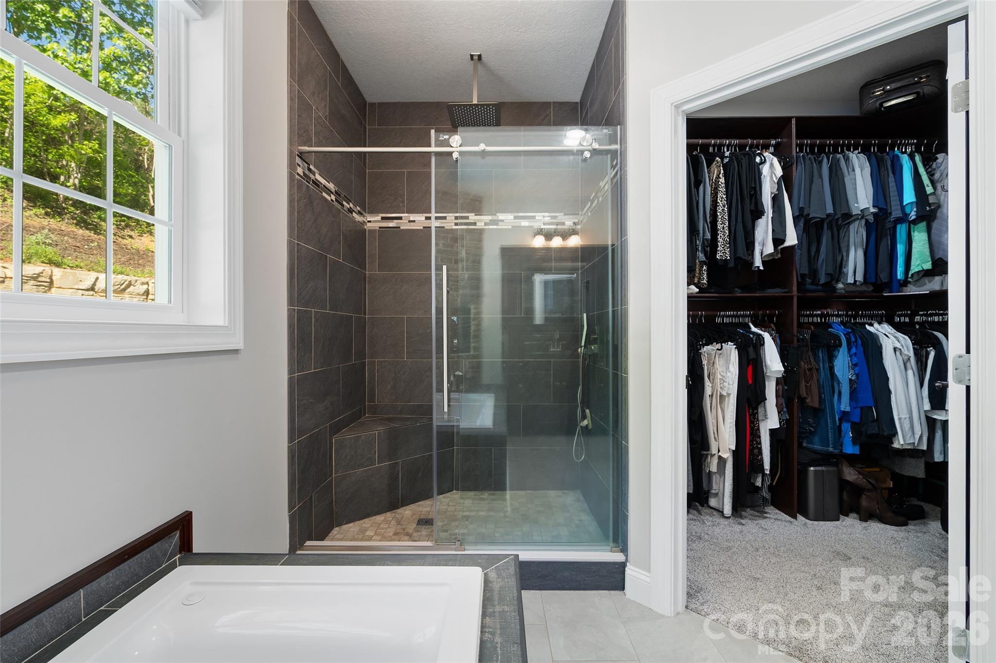 114 Nesting Ridge Waynesville, NC 28785 - Photo 20 of 40 a view of walk in closet and a bathroom