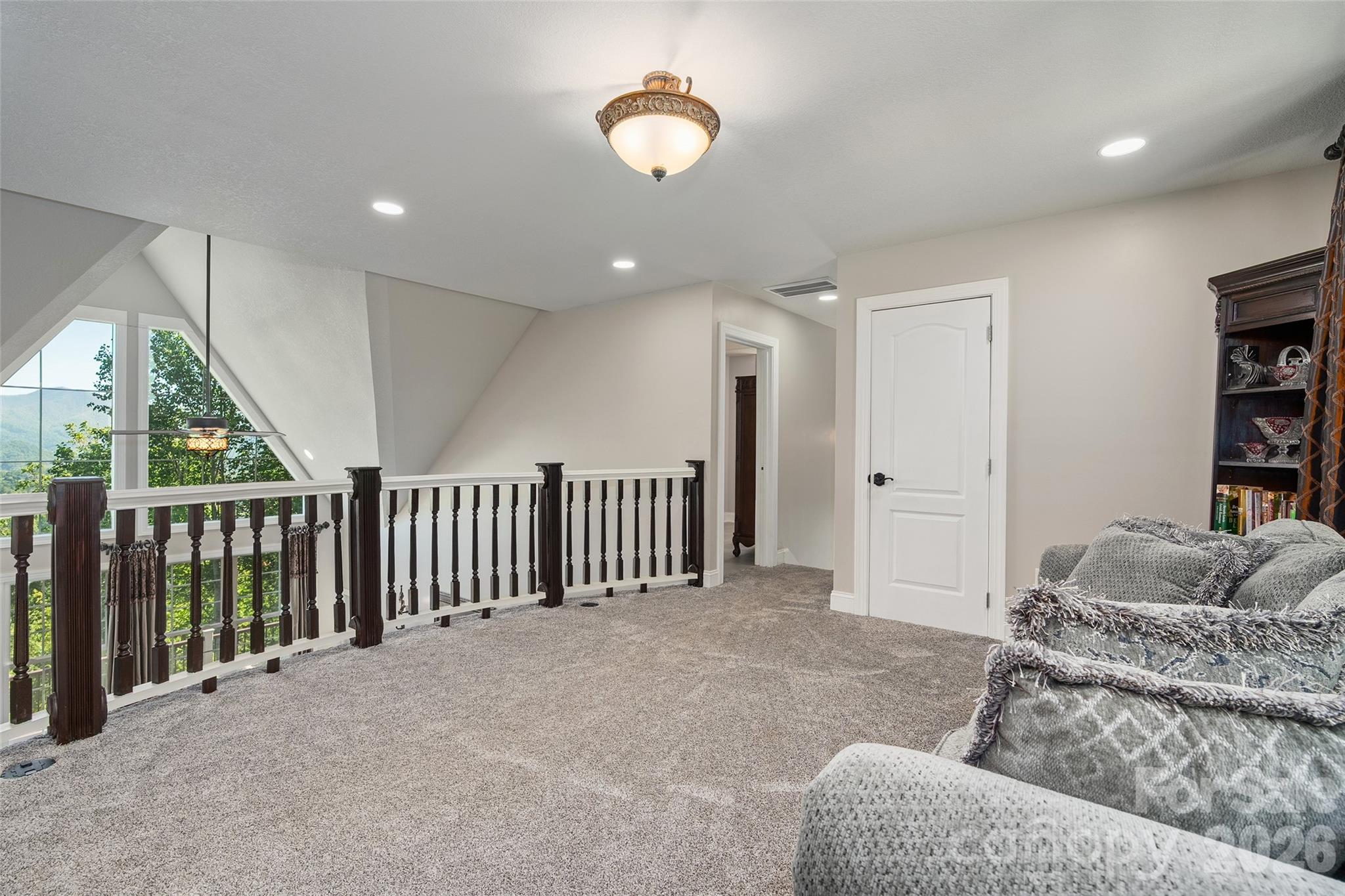 114 Nesting Ridge Waynesville, NC 28785 - Photo 24 of 40 a living room with furniture window and a rug