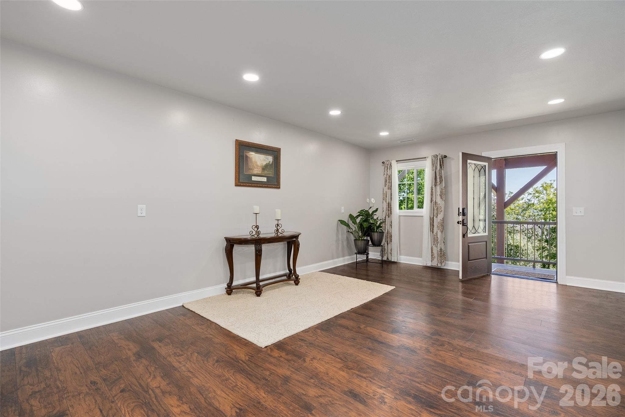 114 Nesting Ridge Waynesville, NC 28785 - Photo 30 of 40 a view of a work space with wooden floor and a potted plant