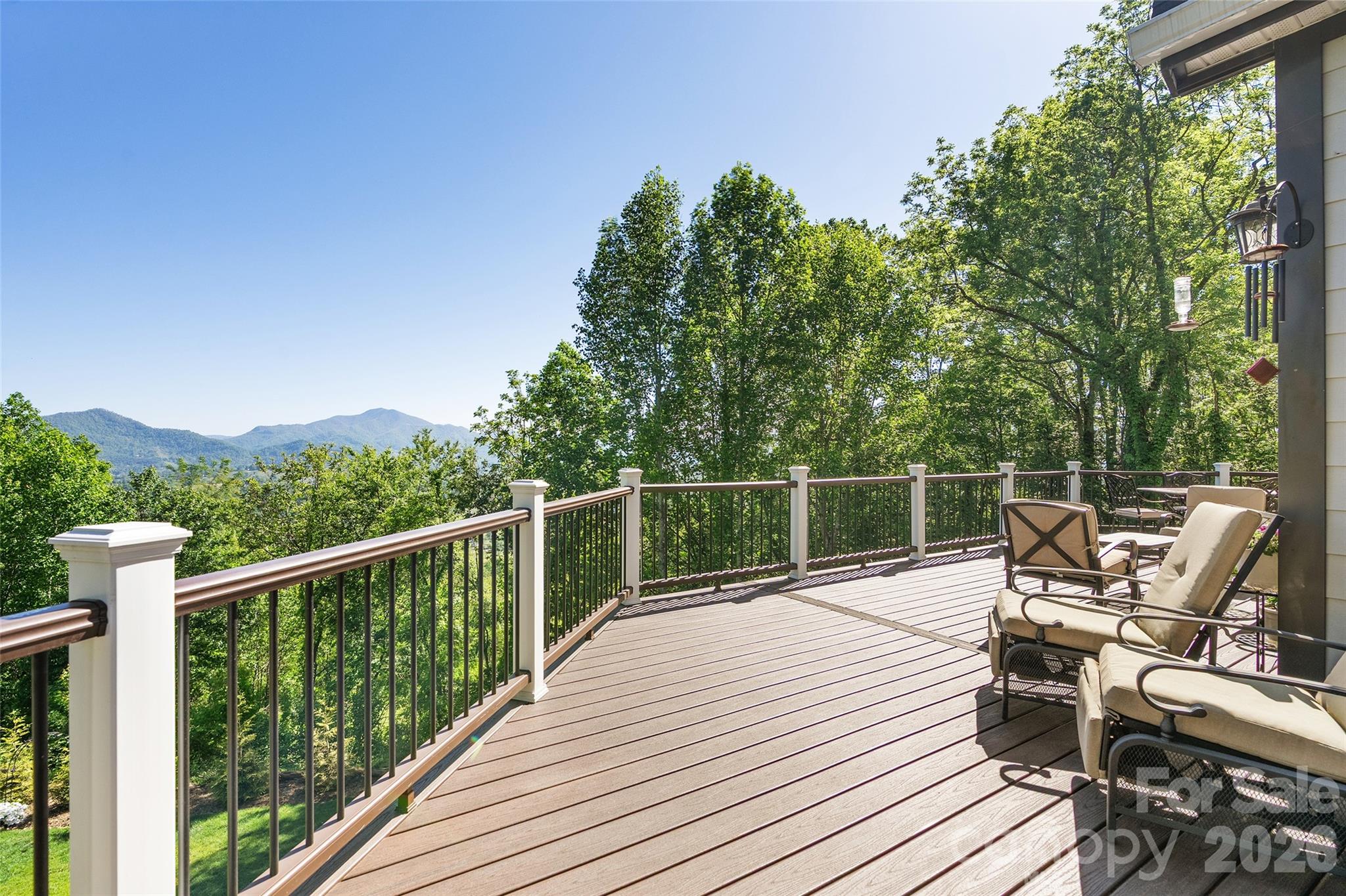 114 Nesting Ridge Waynesville, NC 28785 - Photo 3 of 40 a deck view with a seating space