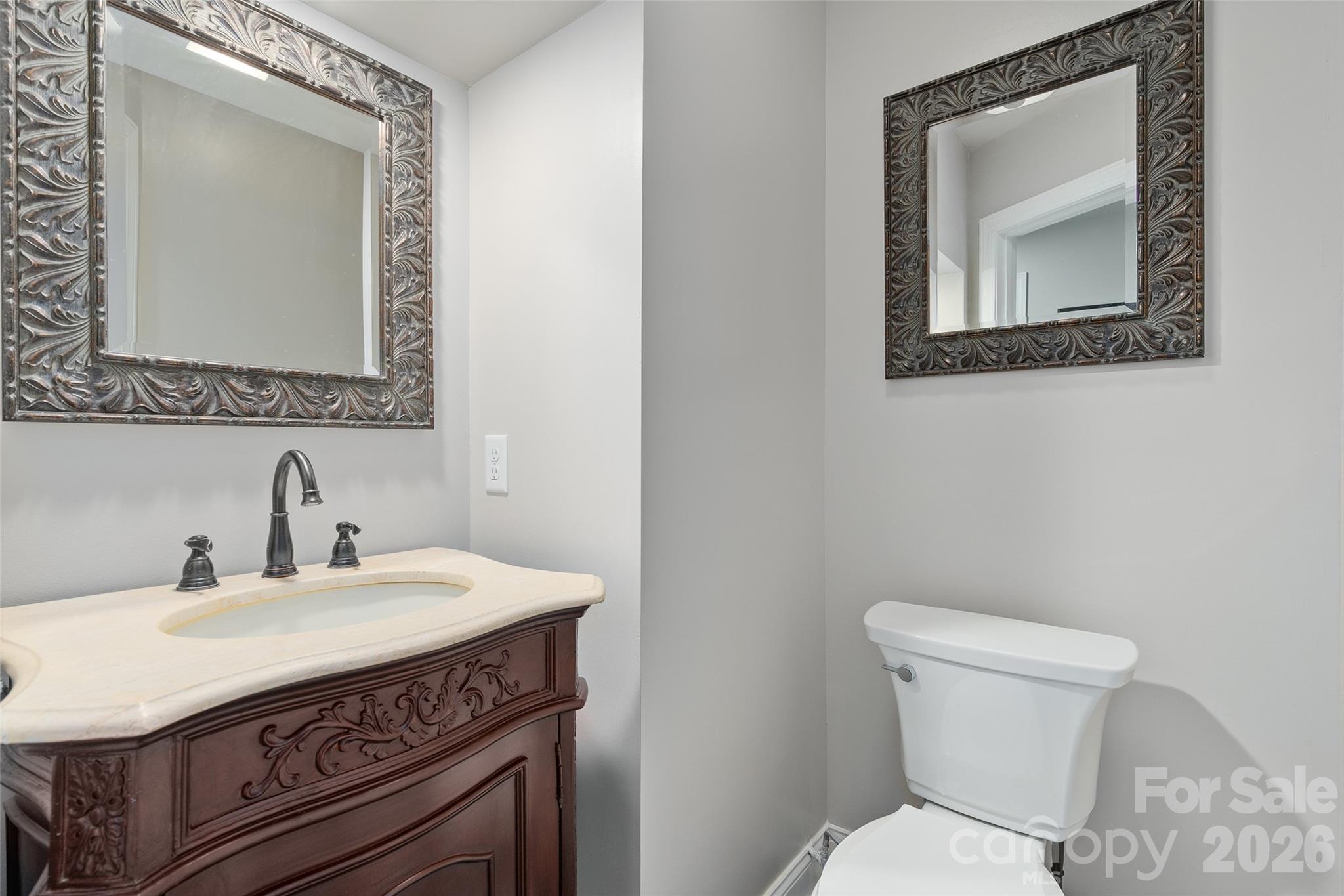 114 Nesting Ridge Waynesville, NC 28785 - Photo 33 of 40 a bathroom with a sink a toilet and mirror