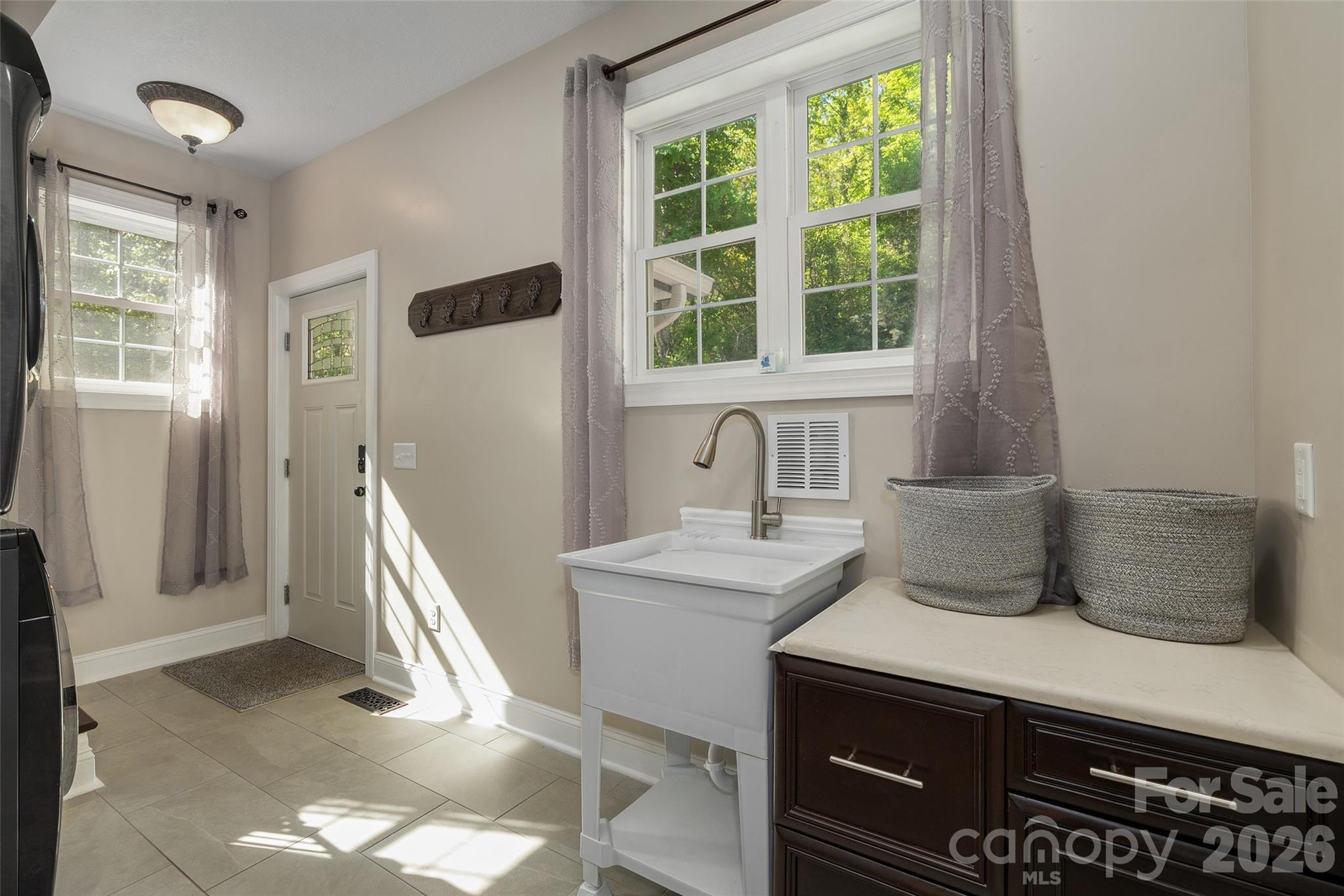 114 Nesting Ridge Waynesville, NC 28785 - Photo 35 of 40 a kitchen with a sink and a window