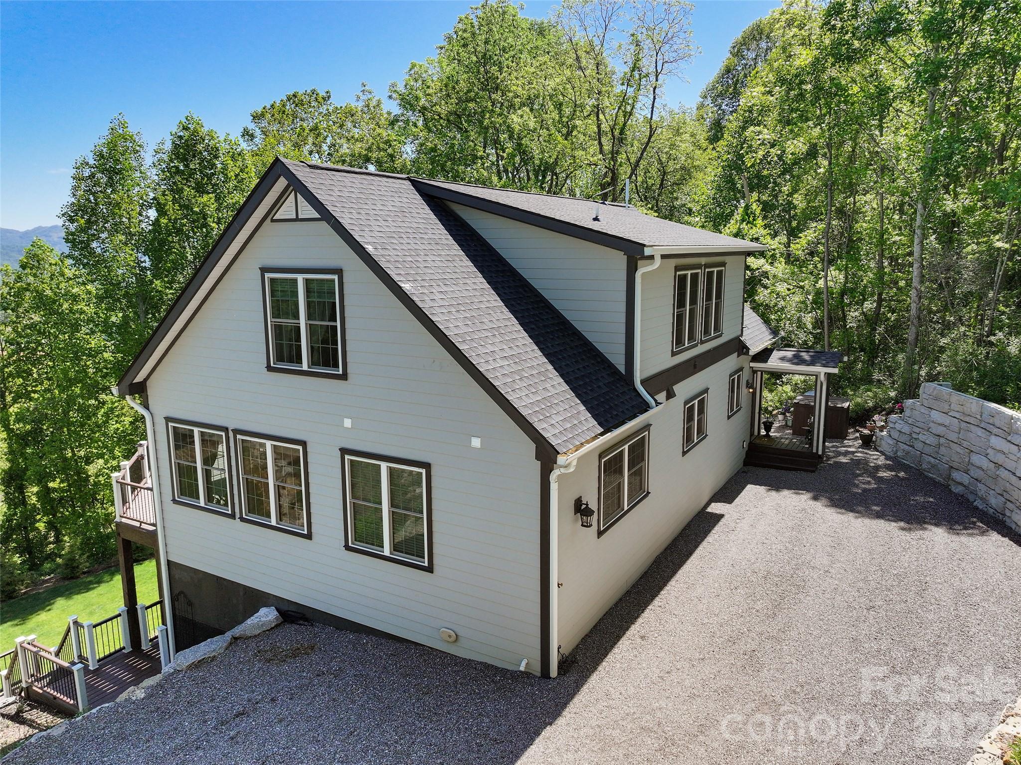 114 Nesting Ridge Waynesville, NC 28785 - Photo 37 of 40 a view of a house with a yard