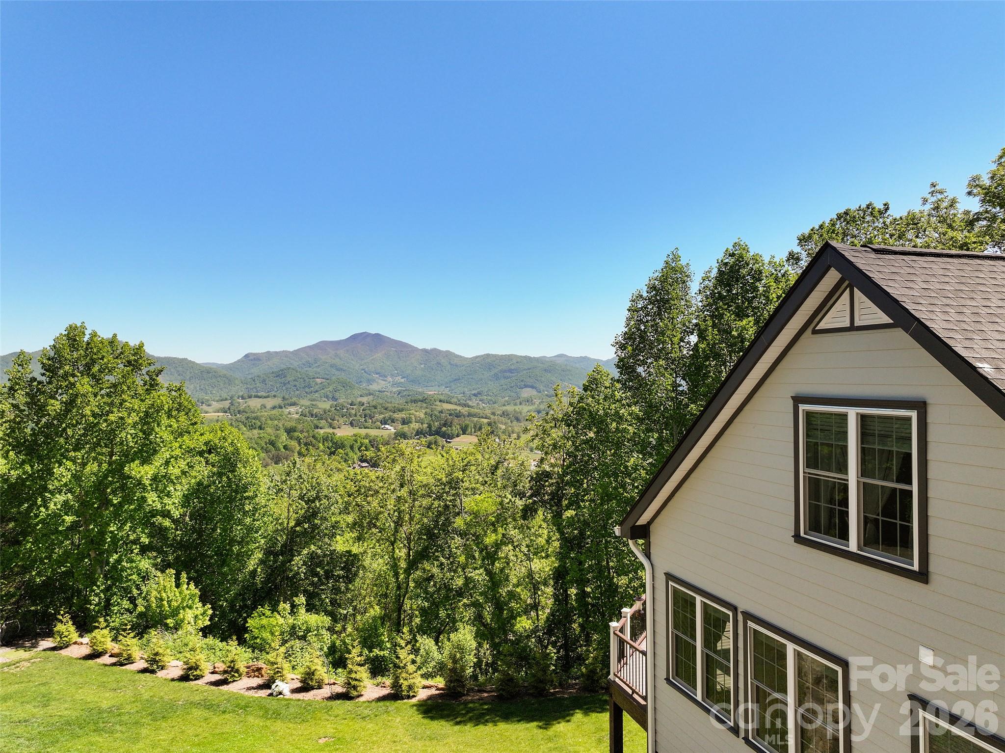 114 Nesting Ridge Waynesville, NC 28785 - Photo 7 of 40 a view of a house with a yard