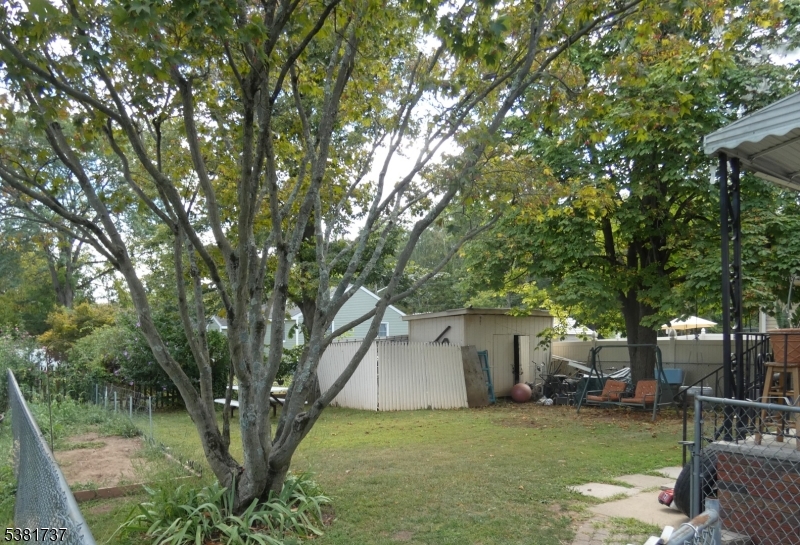 1911 West Camplain Road Manville, NJ 08835 - Photo 3 of 3 a view of a house with backyard and sitting area