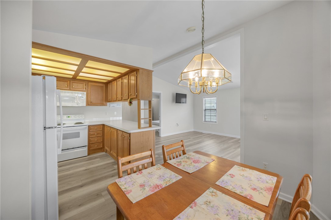 1230 Melton Road, Unit 25 West Union, SC 29696 - Photo 37 of 46 A well-equipped kitchen and dining area offer seamless flow and comfortable living.