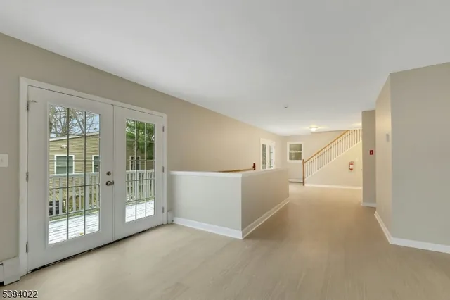 an empty room with windows