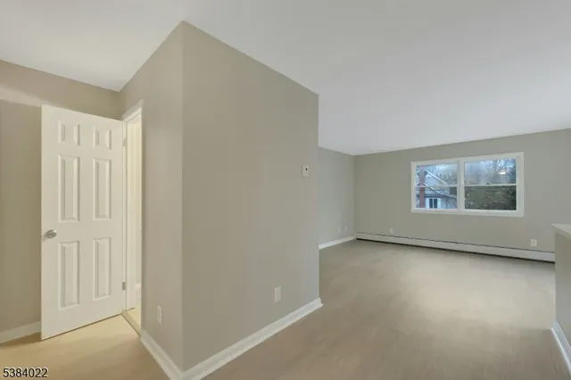 a kitchen with a stove and a microwave