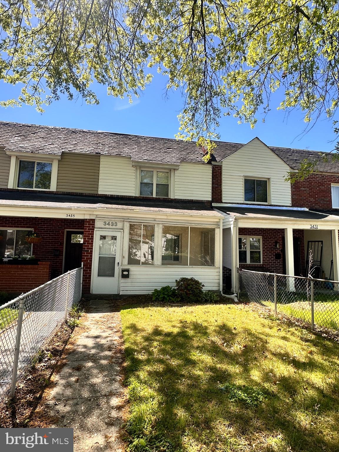 3433 Clay Street Northeast Washington, DC 20019 - Photo 1 of 19 a front view of a house with a yard