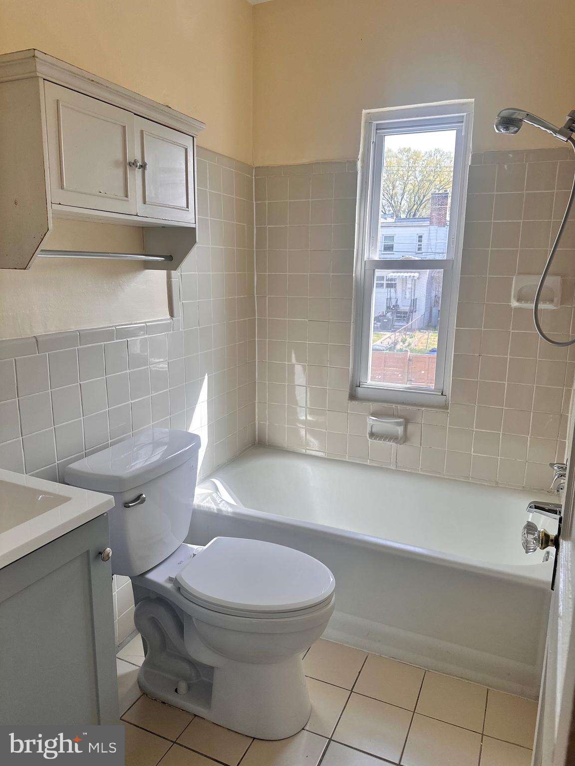 3433 Clay Street Northeast Washington, DC 20019 - Photo 11 of 19 a bathroom with a toilet a sink and a shower