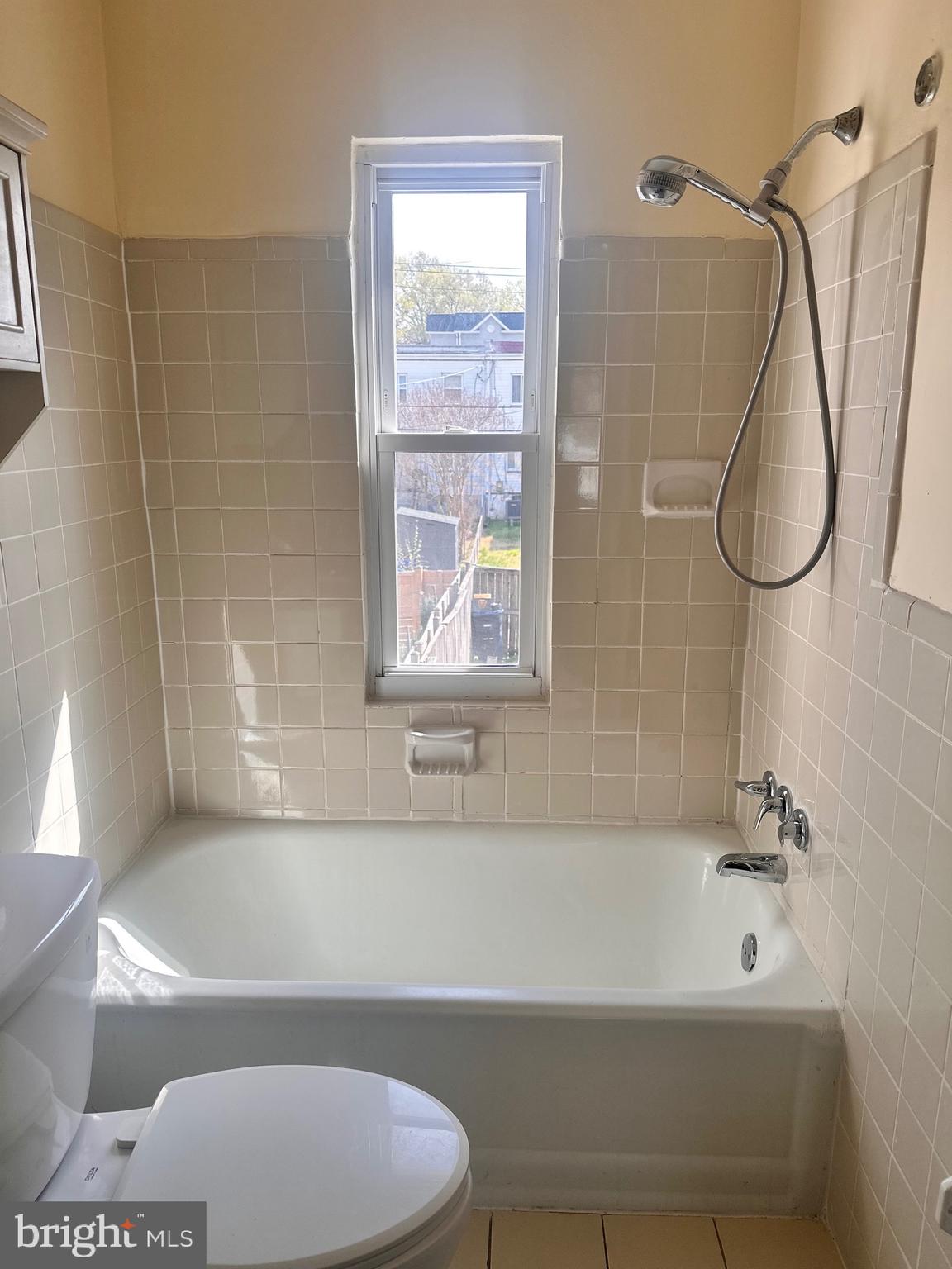 3433 Clay Street Northeast Washington, DC 20019 - Photo 12 of 19 a bathroom with a bath tub a sink and a shower