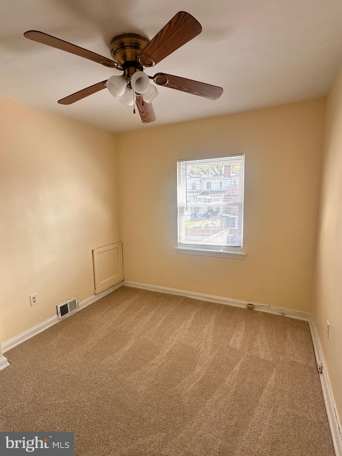 3433 Clay Street Northeast Washington, DC 20019 - Photo 14 of 19 a view of an empty room with a window