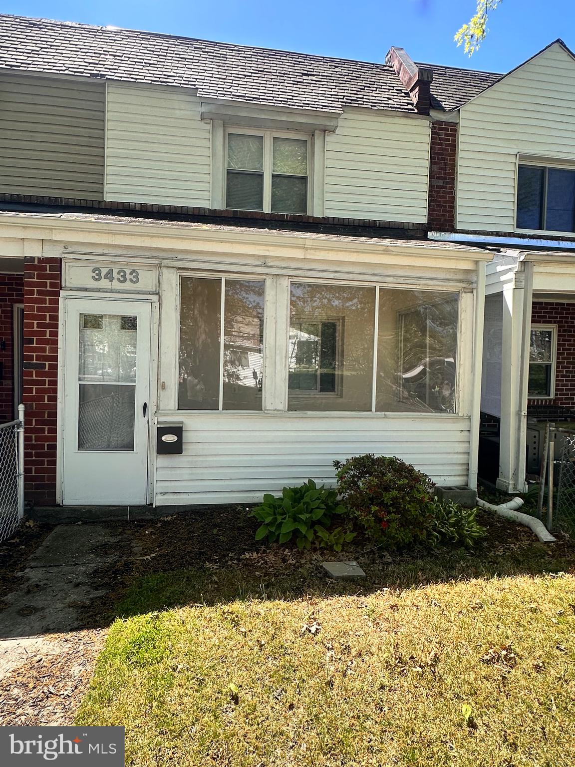 3433 Clay Street Northeast Washington, DC 20019 - Photo 2 of 19 a front view of a house with a yard