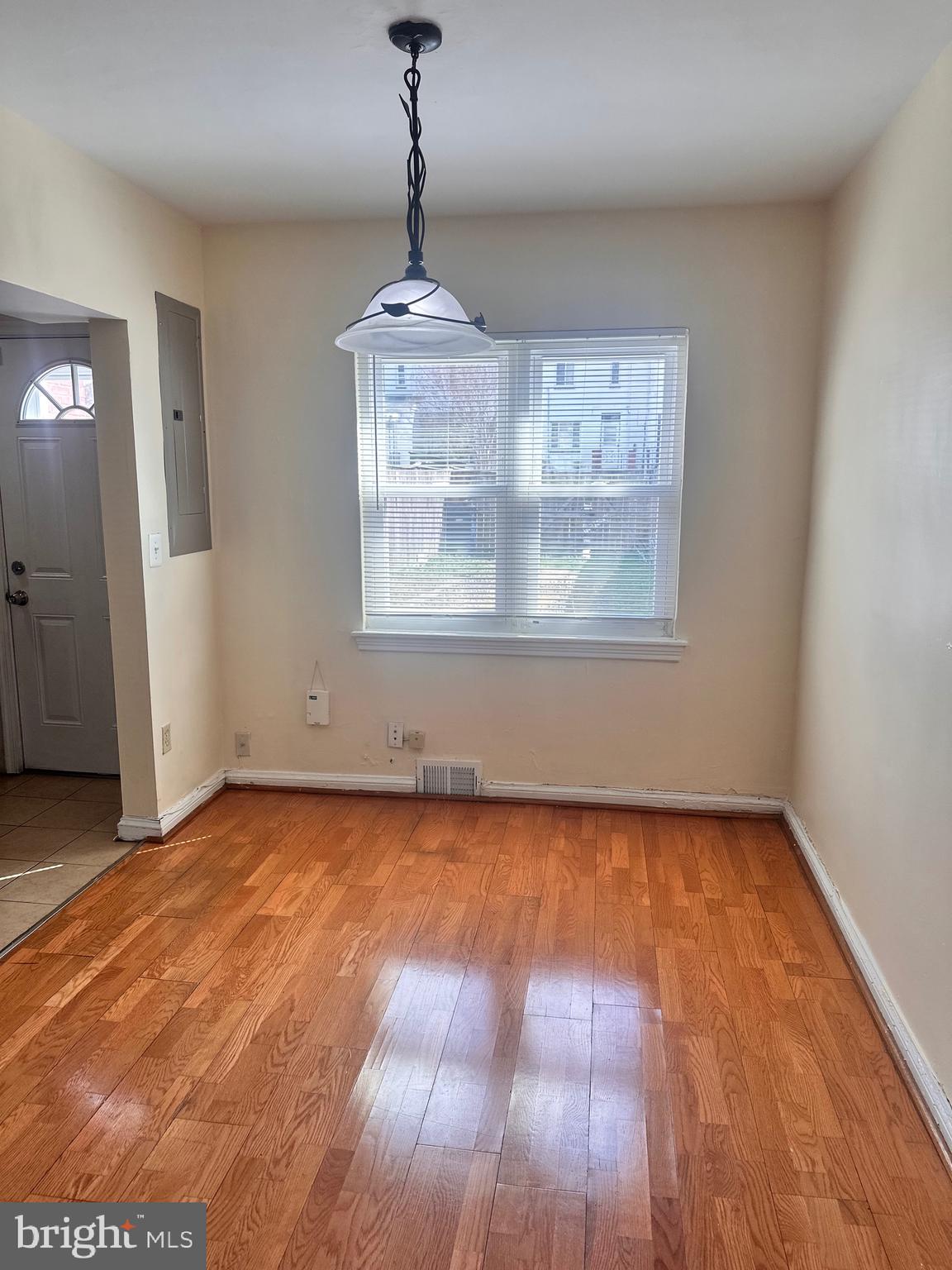 3433 Clay Street Northeast Washington, DC 20019 - Photo 8 of 19 a view of a room with wooden floor and windows