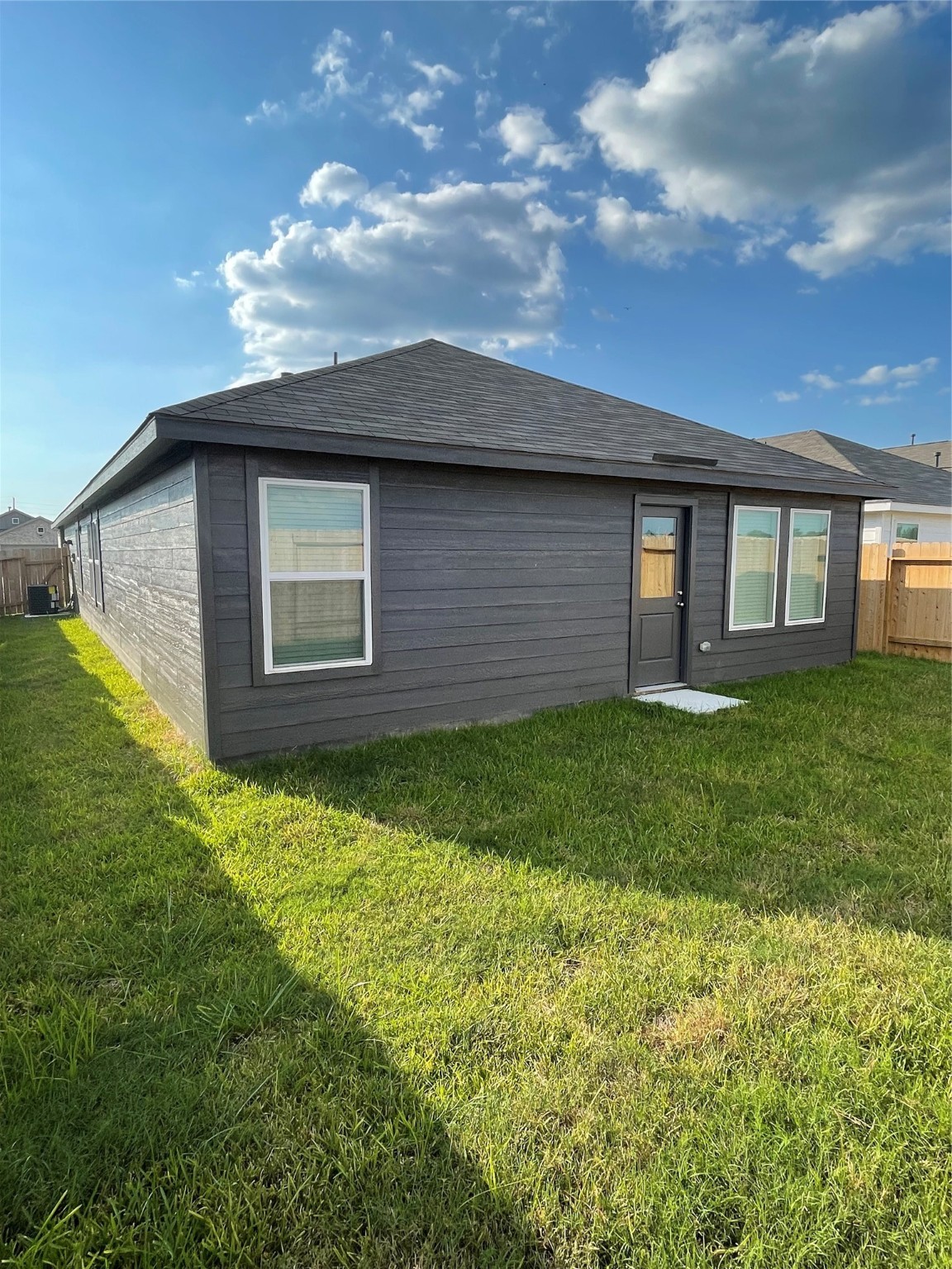 12922 Shells Lane Crosby, TX 77532 - Photo 14 of 14 a front view of a house with a garden