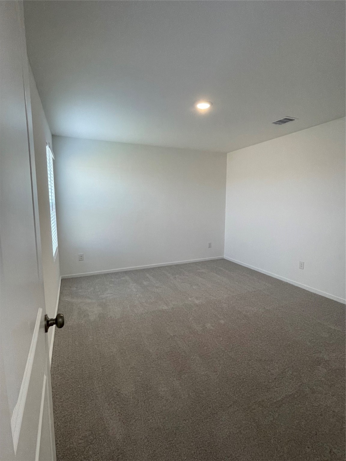 12922 Shells Lane Crosby, TX 77532 - Photo 5 of 14 an empty room with windows