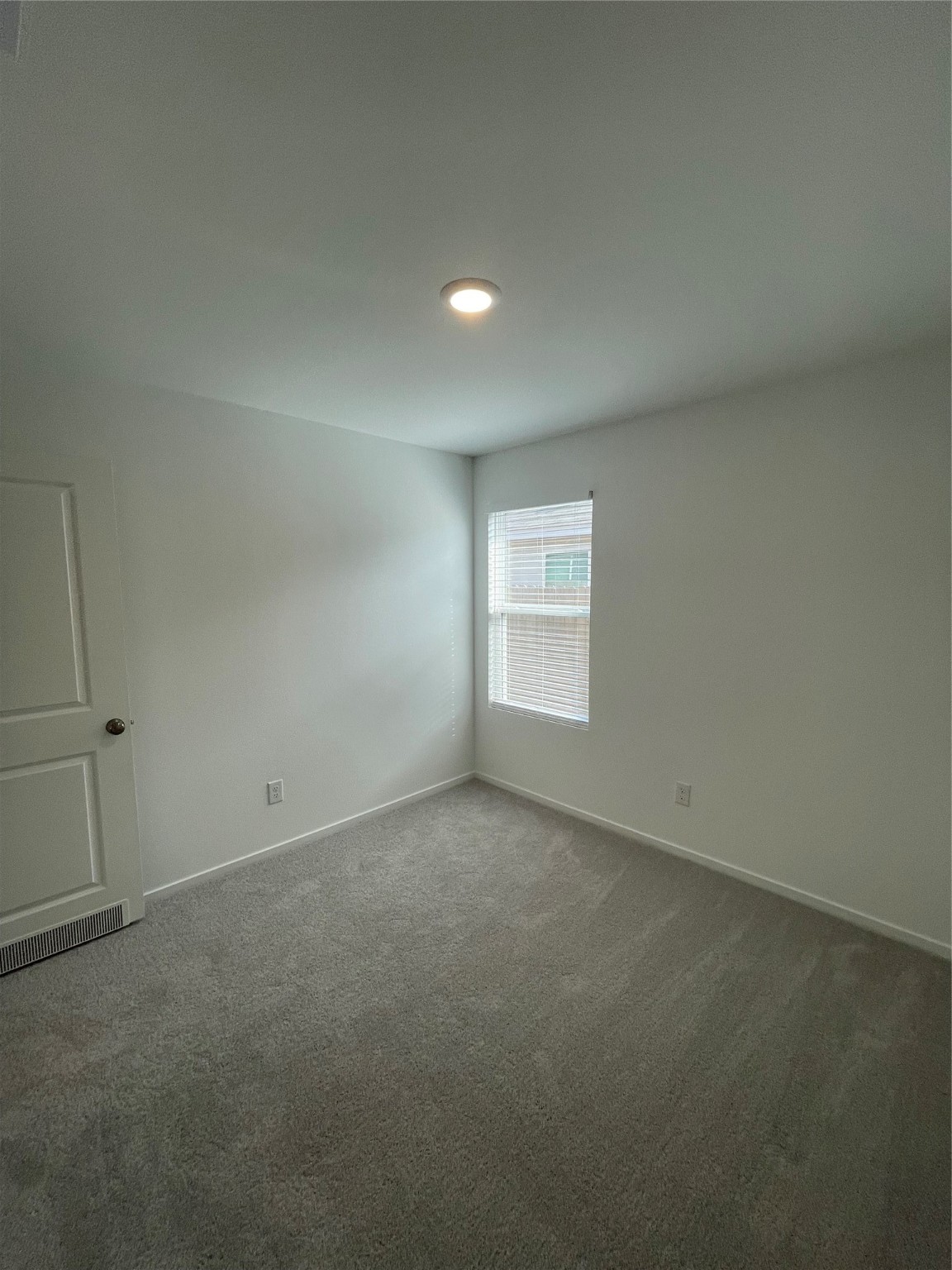 12922 Shells Lane Crosby, TX 77532 - Photo 8 of 14 a view of an empty room and a window