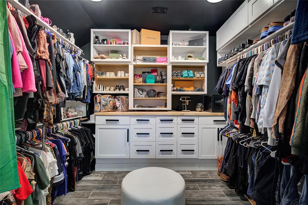 2027 Park Springs Road Sulphur Springs, TX 75482 - Photo 24 of 39 a view of walk in closet with clothes and shoes