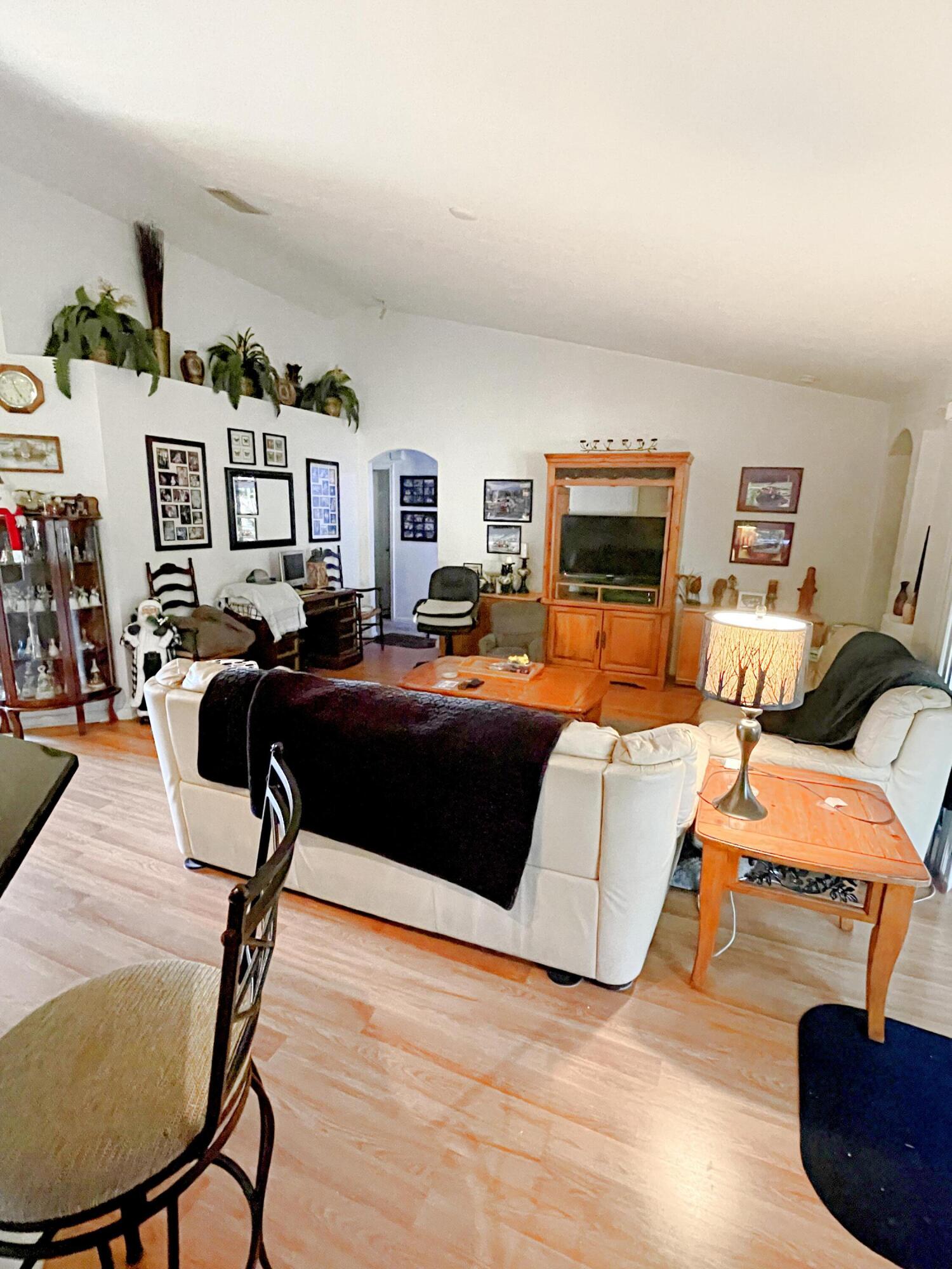2099 Southwest Del Rio Boulevard Port St. Lucie, FL 34953 - Photo 10 of 21 Living room angle 2