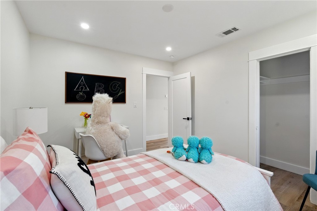 4340 2nd Avenue Los Angeles, CA 90008 - Photo 14 of 51 a bedroom with a bed and a couch