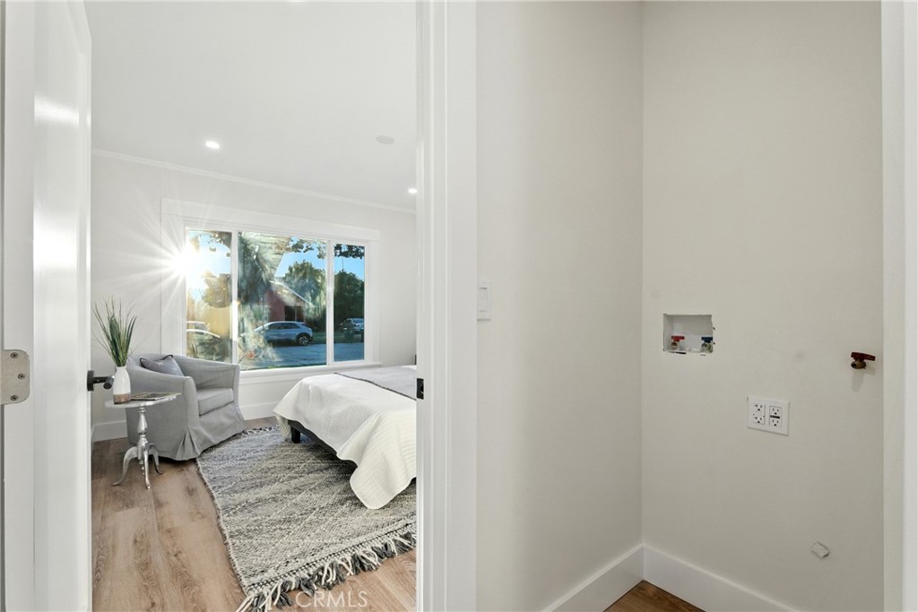 4340 2nd Avenue Los Angeles, CA 90008 - Photo 18 of 51 a living room with furniture and a large window