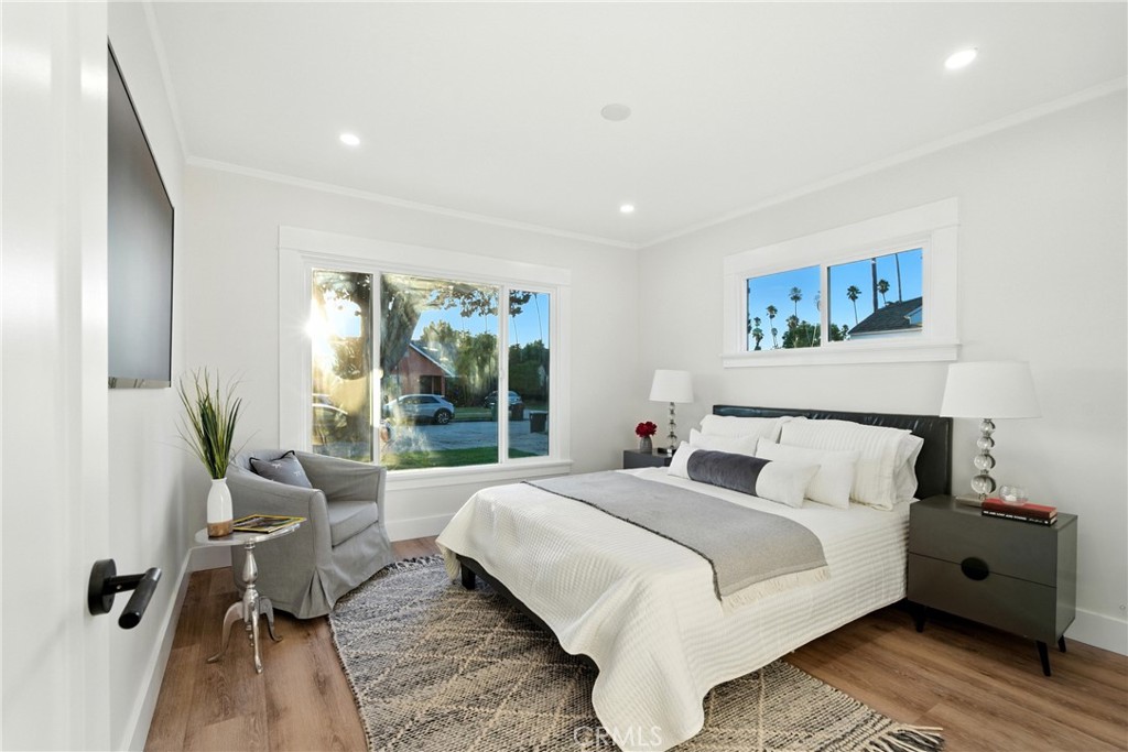 4340 2nd Avenue Los Angeles, CA 90008 - Photo 19 of 51 a bed room with a bed and a couch