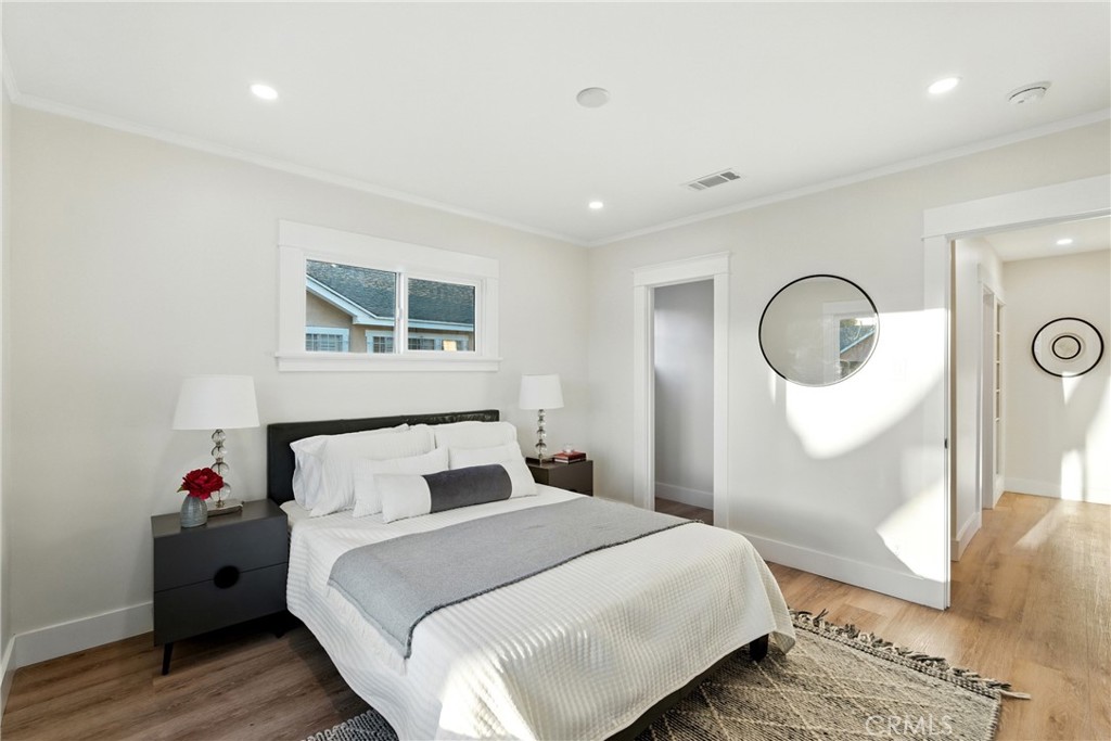 4340 2nd Avenue Los Angeles, CA 90008 - Photo 20 of 51 a bedroom with a bed and a dresser