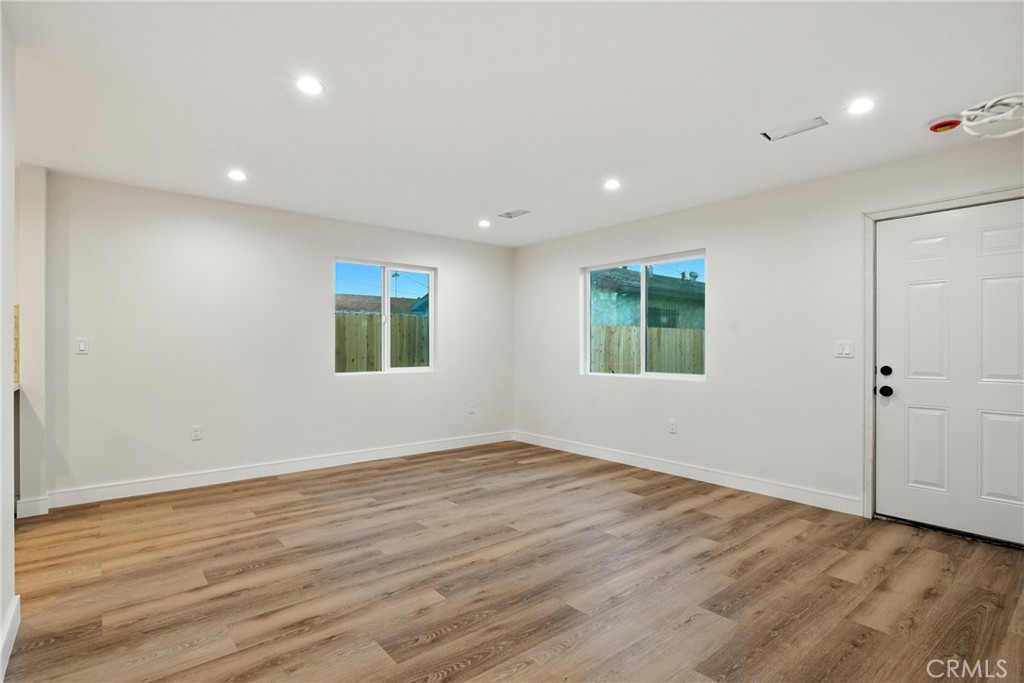 4340 2nd Avenue Los Angeles, CA 90008 - Photo 34 of 51 a view of empty room with wooden floor and fan