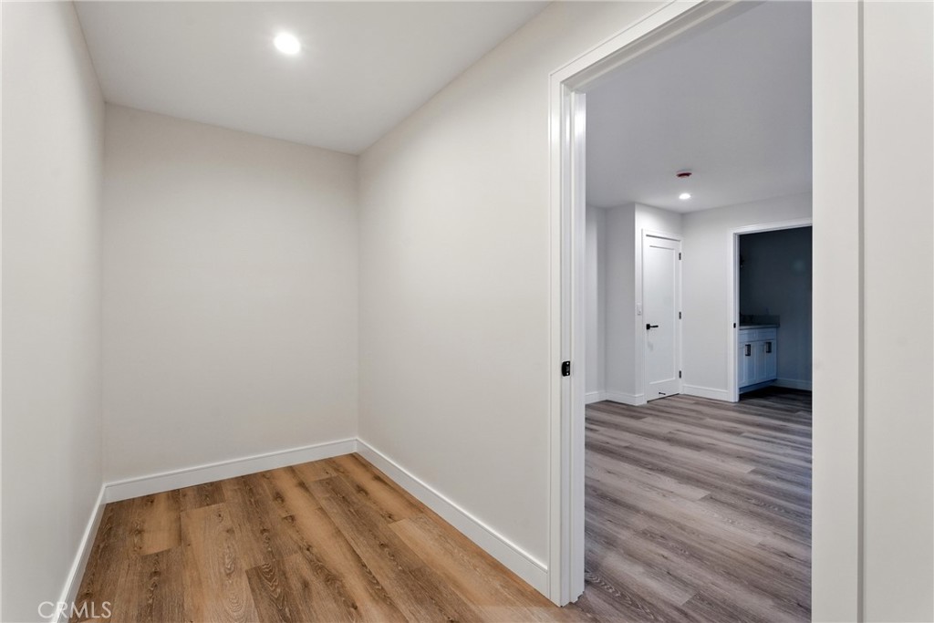 4340 2nd Avenue Los Angeles, CA 90008 - Photo 41 of 51 a view of a room with wooden floor and a bathroom