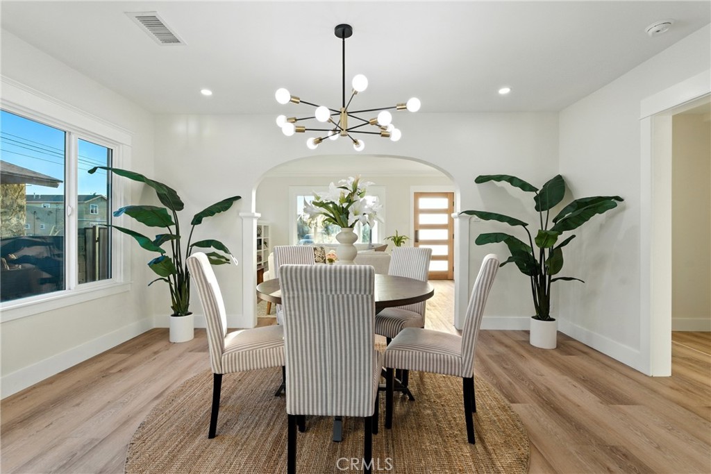 4340 2nd Avenue Los Angeles, CA 90008 - Photo 6 of 51 a view of a dining room with furniture window and wooden floor