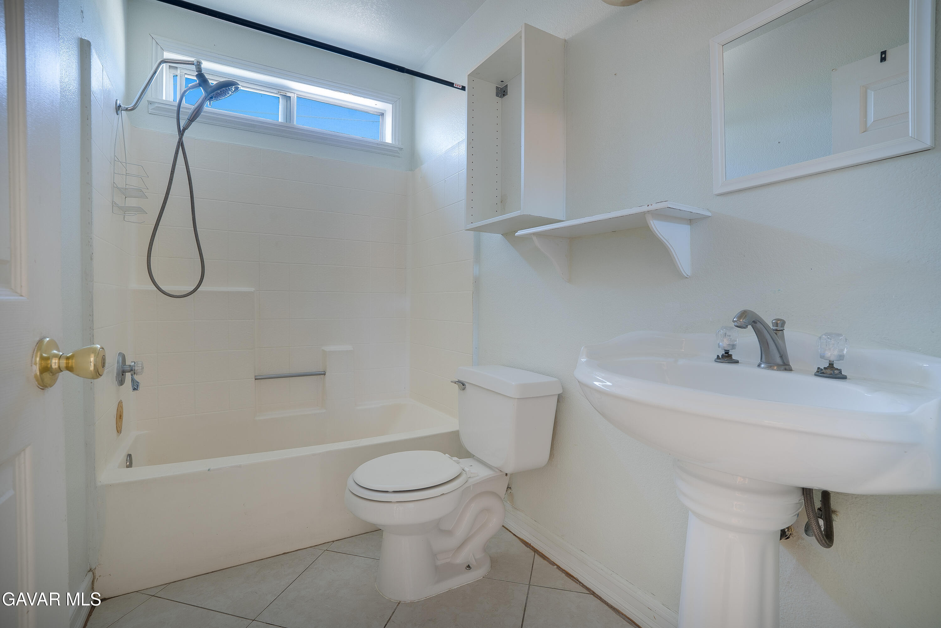 4015 Triton Drive Palmdale, CA 93552 - Photo 11 of 19 a white toilet sitting next to a bath tub