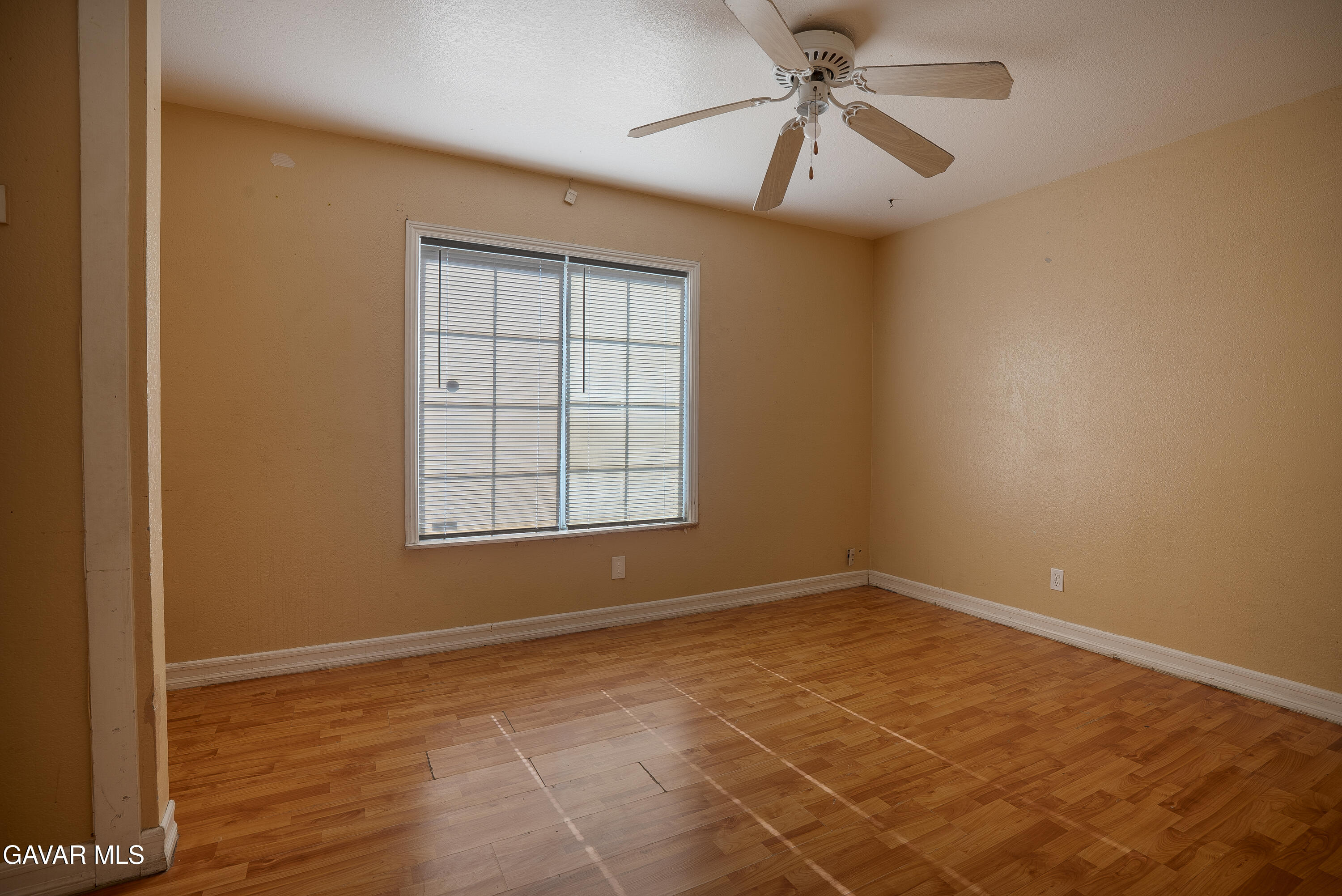 4015 Triton Drive Palmdale, CA 93552 - Photo 7 of 19 a view of an empty room with a window