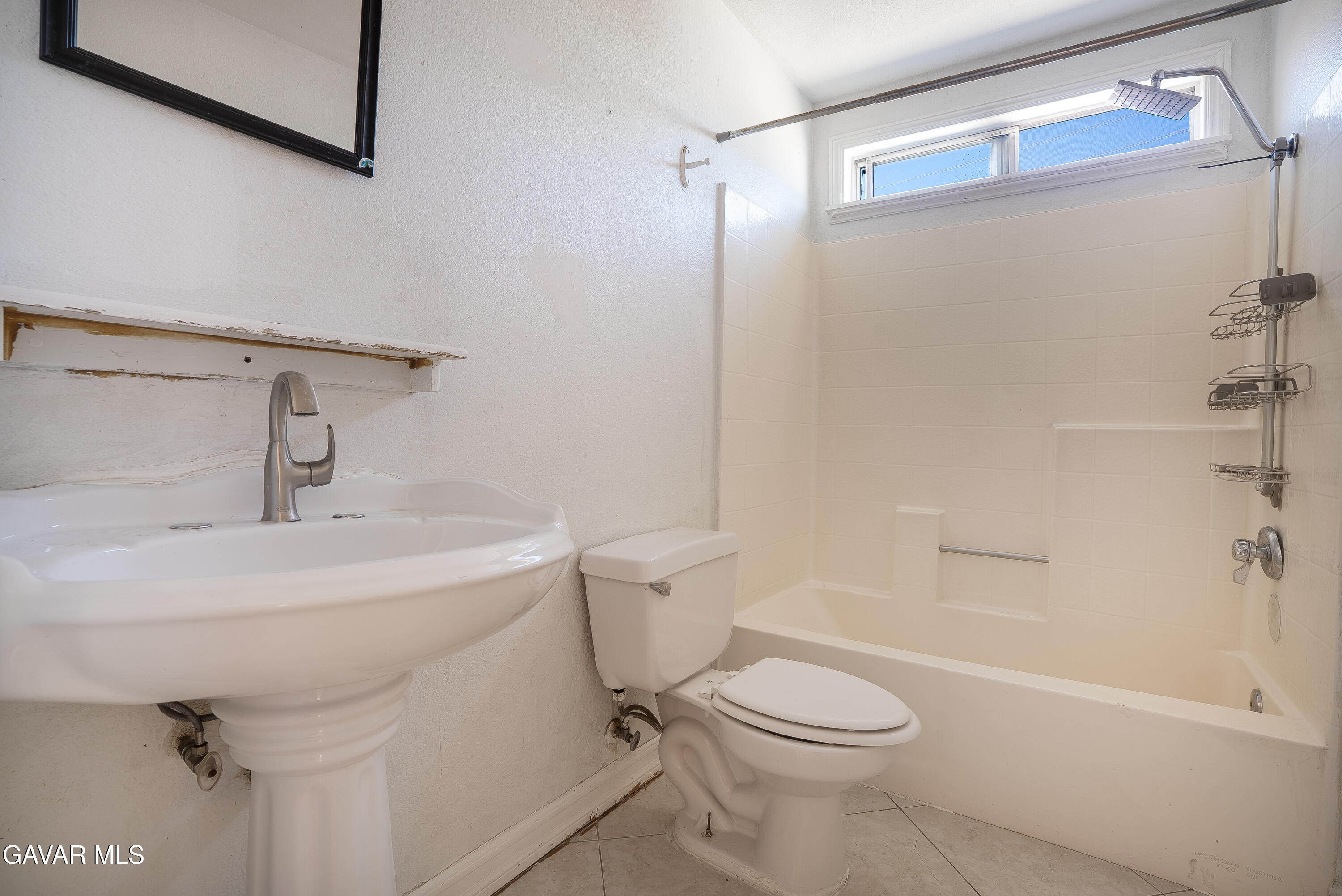 4015 Triton Drive Palmdale, CA 93552 - Photo 10 of 19 a bathroom with a sink a toilet and shower