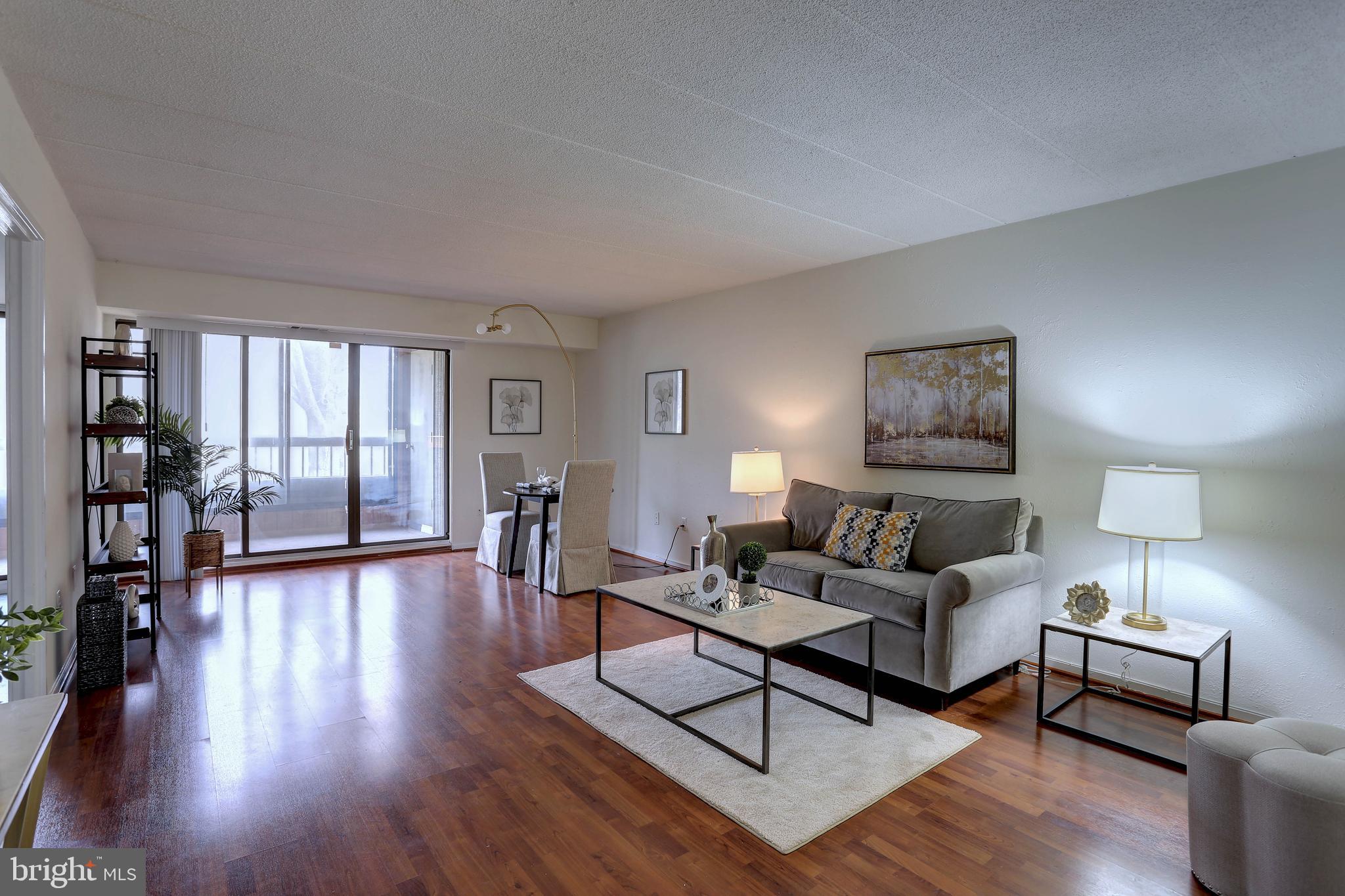 5639 Harpers Farm Road, Unit D Columbia, MD 21044 - Photo 11 of 27 Living Room & 2nd entrance to balcony