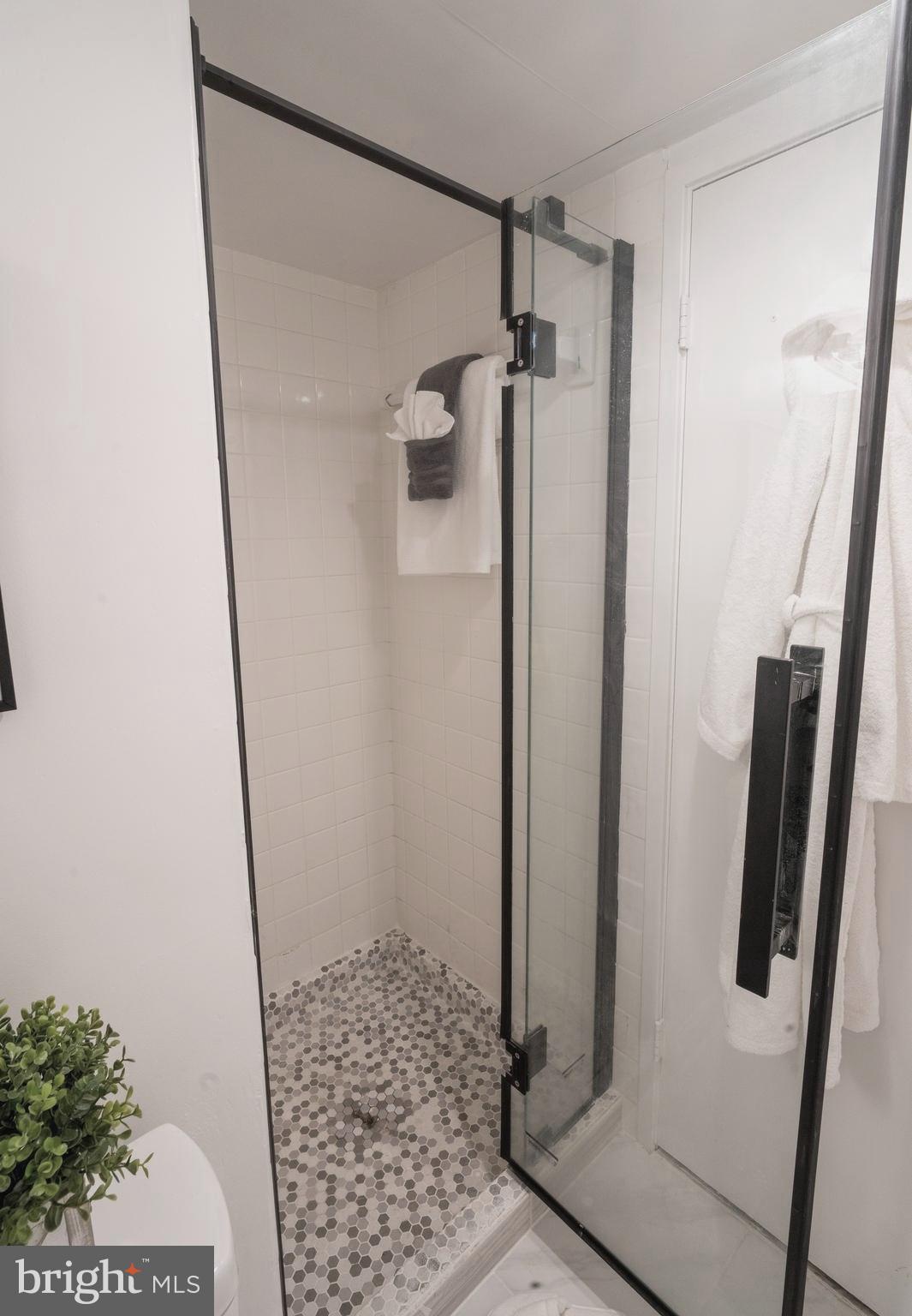 5639 Harpers Farm Road, Unit D Columbia, MD 21044 - Photo 21 of 27 Upgraded shower/ bathroom in 2022