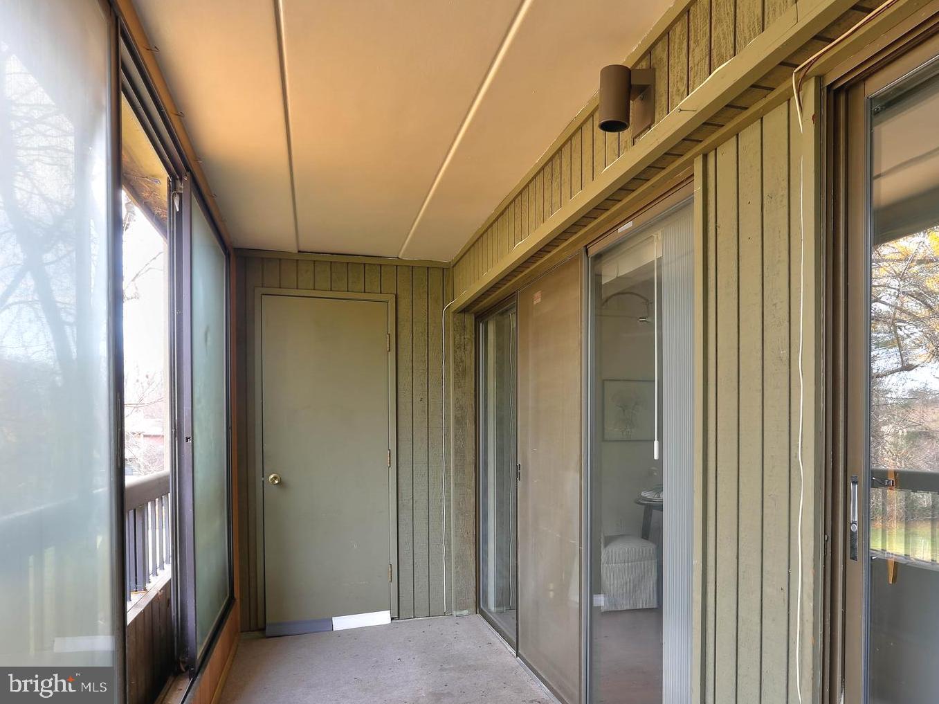 5639 Harpers Farm Road, Unit D Columbia, MD 21044 - Photo 22 of 27 Enclosed Balcony w/ windows & Screens that open