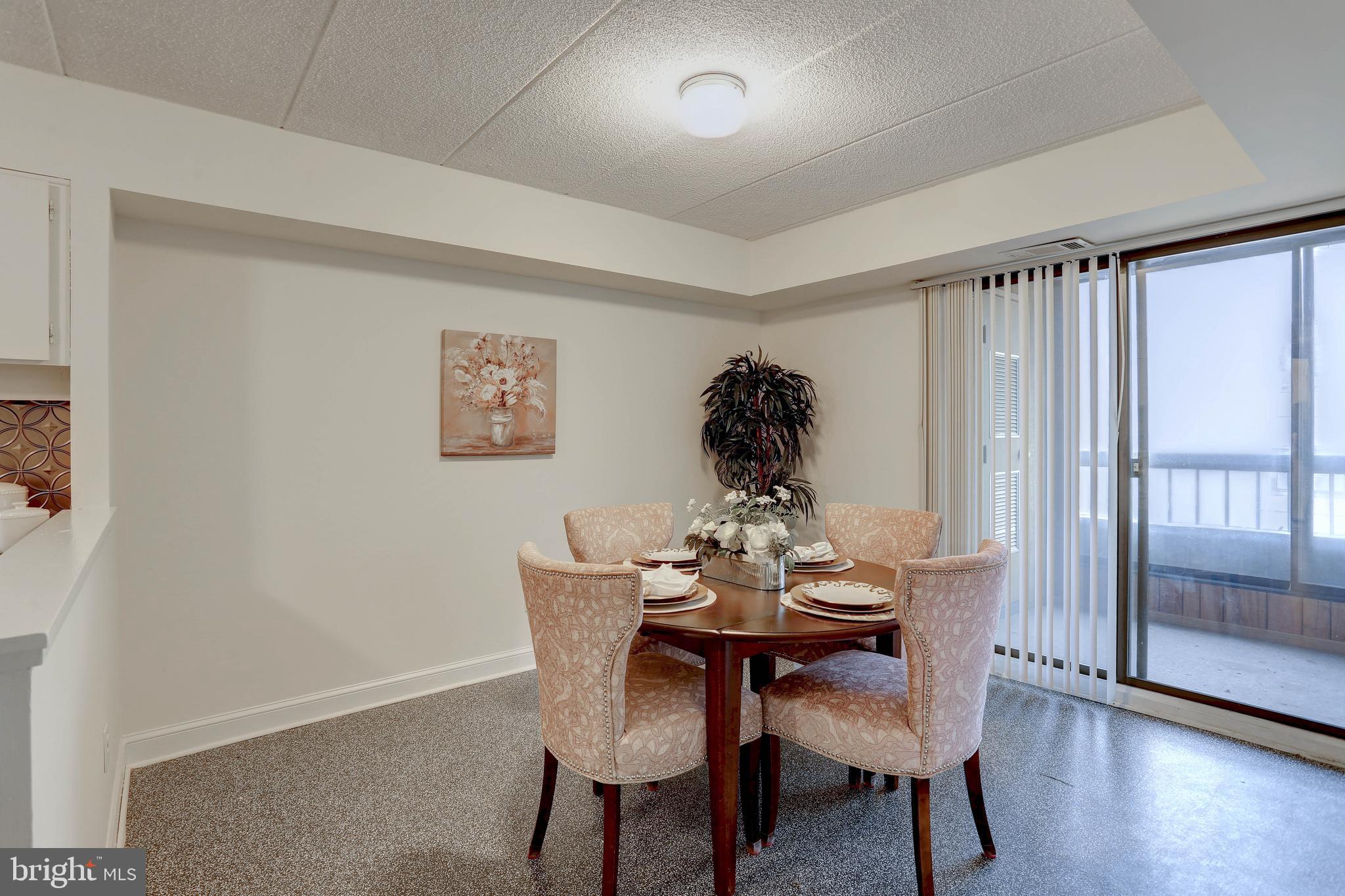 5639 Harpers Farm Road, Unit D Columbia, MD 21044 - Photo 9 of 27 Eat-in-Kitchen w/ access to the balcony