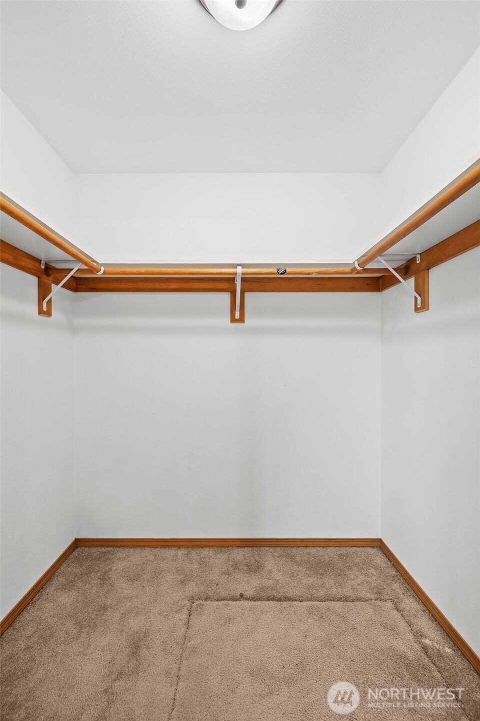 980 Capstone Avenue Othello, WA 99344 - Photo 16 of 20 a view of small space with racks on the wall