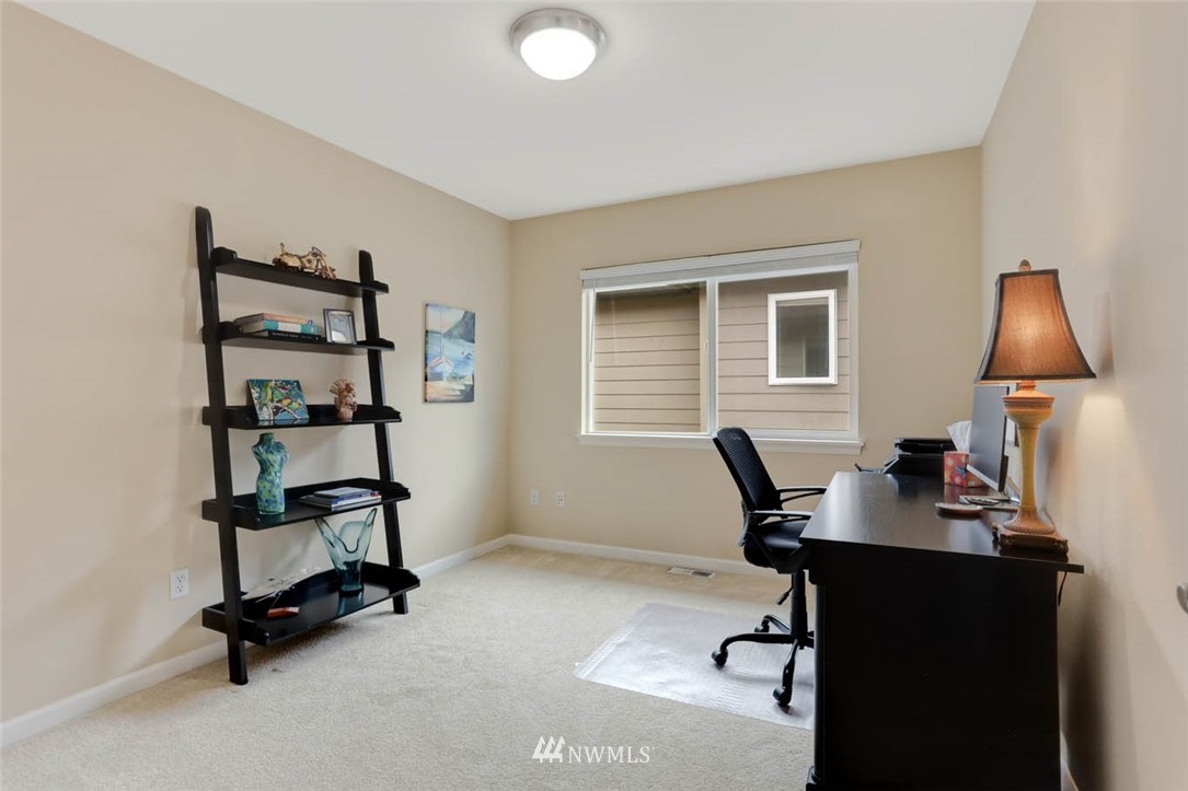 17112 164th Way Southeast Renton, WA 98058 - Photo 29 of 35 a view of a workspace with furniture and a window