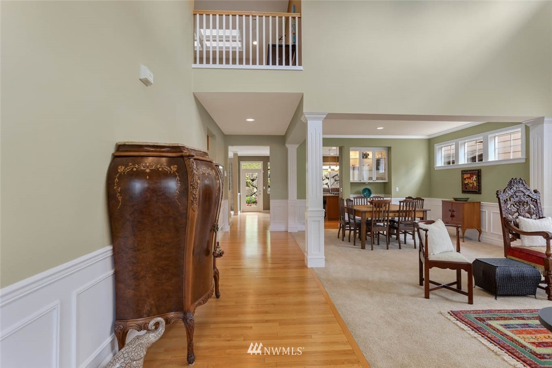 17112 164th Way Southeast Renton, WA 98058 - Photo 4 of 35 a view of a livingroom with furniture and wooden floor