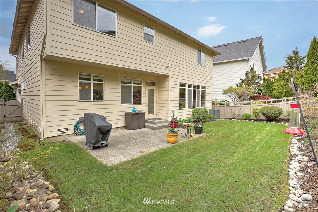 17112 164th Way Southeast Renton, WA 98058 - Photo 33 of 35 a front view of house with yard and seating area