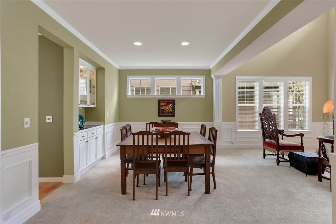17112 164th Way Southeast Renton, WA 98058 - Photo 7 of 35 a view of a dining room with furniture window and outside view