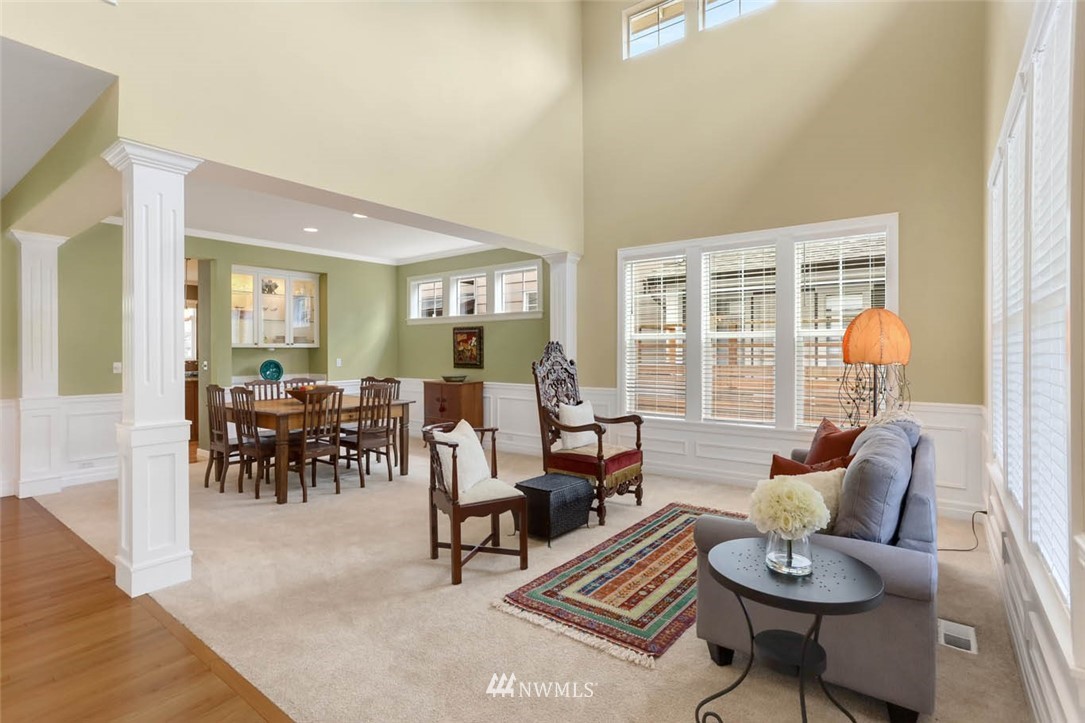 17112 164th Way Southeast Renton, WA 98058 - Photo 8 of 35 a living room with furniture and wooden floor