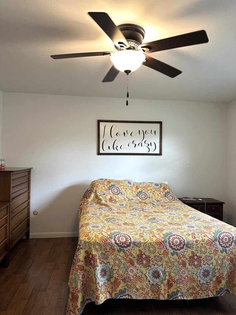 8693 Durbin Lane Crown Point, IN 46307 - Photo 13 of 18 a bedroom with a bed and a dresser