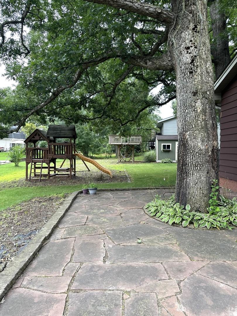 8693 Durbin Lane Crown Point, IN 46307 - Photo 17 of 18 a view of a park with large trees