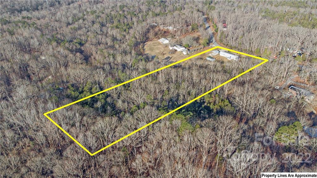 421 Lancaster Estate Road Indian Land, SC 29707 - Photo 2 of 4 a view of a forest from a balcony